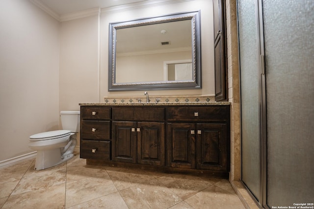 bathroom featuring ornamental molding, visible vents, vanity, and toilet