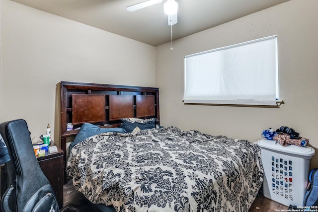 bedroom featuring ceiling fan and wood finished floors