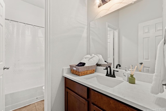 full bathroom featuring shower / bath combination with curtain, vanity, toilet, and tile patterned floors