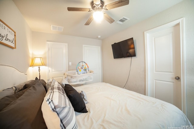 bedroom featuring visible vents and a ceiling fan