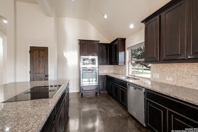 kitchen with dark brown cabinetry, decorative backsplash, appliances with stainless steel finishes, concrete flooring, and a sink