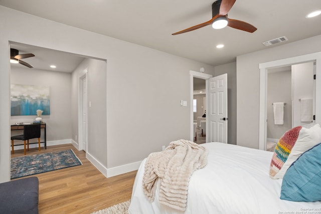 bedroom featuring recessed lighting, visible vents, ensuite bathroom, light wood-style floors, and baseboards