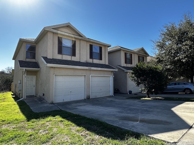 view of property with driveway, roof with shingles, an attached garage, and stucco siding