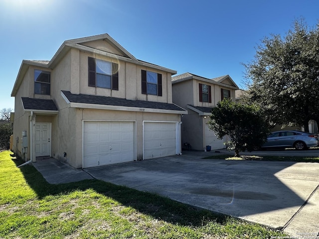 view of front of home featuring a garage, concrete driveway, roof with shingles, and stucco siding