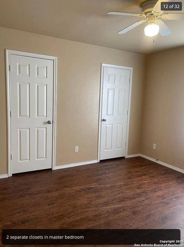 unfurnished bedroom featuring dark wood-style floors, baseboards, and a ceiling fan