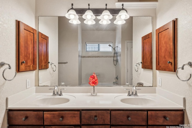 bathroom with double vanity and a sink