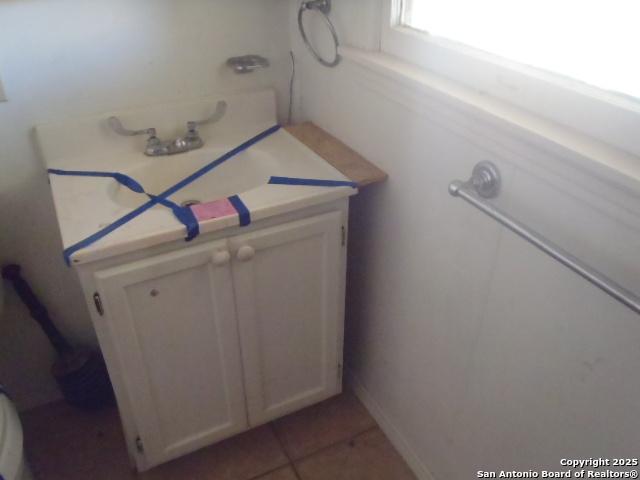 bathroom featuring vanity and tile patterned floors