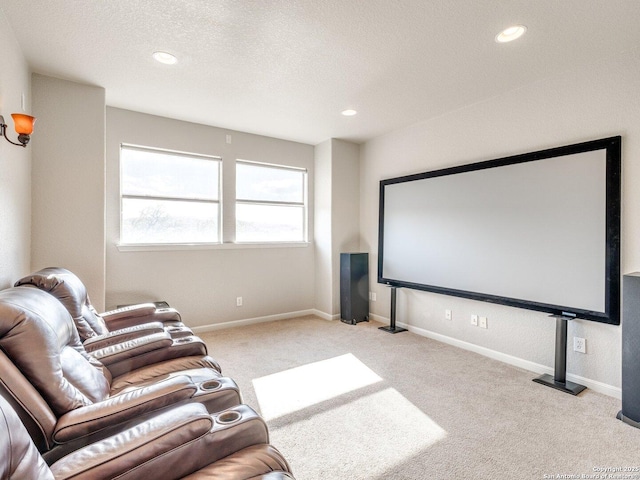 cinema featuring a textured ceiling, recessed lighting, carpet, and baseboards