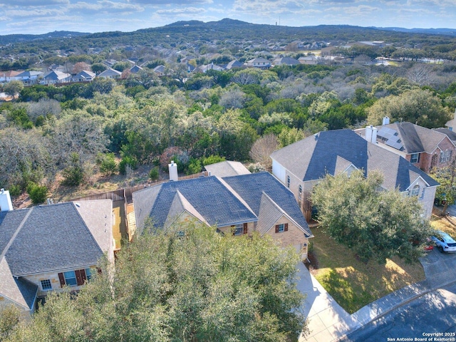 drone / aerial view with a residential view and a mountain view