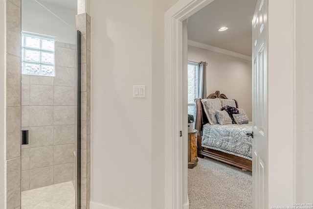 ensuite bathroom featuring recessed lighting, a shower stall, ornamental molding, and ensuite bathroom