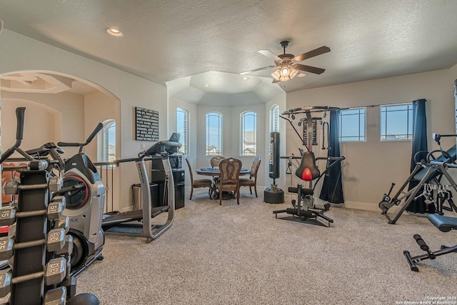 exercise area with recessed lighting, a ceiling fan, carpet flooring, a textured ceiling, and baseboards