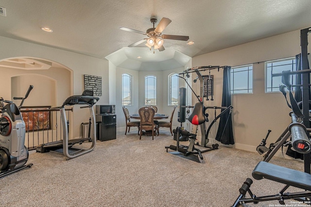 exercise room with carpet, recessed lighting, visible vents, a textured ceiling, and baseboards