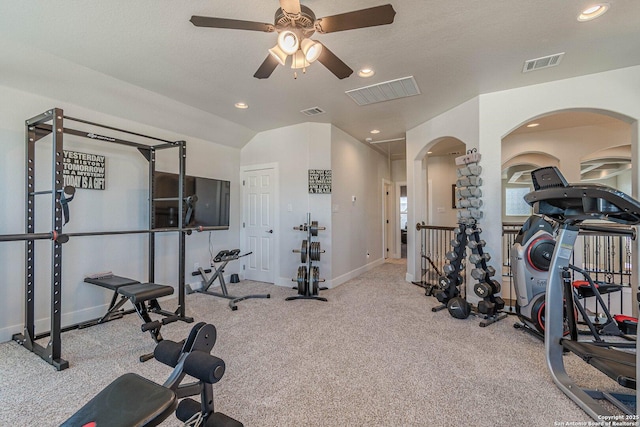 exercise area featuring lofted ceiling, visible vents, and recessed lighting