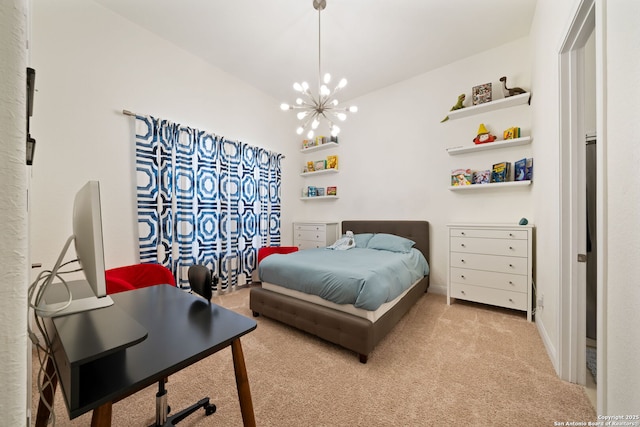 bedroom featuring carpet and a notable chandelier