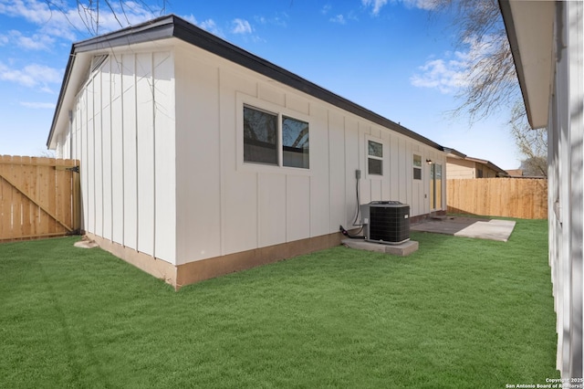 9502 Tarleton, San Antonio, TX 78223 - back of property with cooling unit and board and batten siding