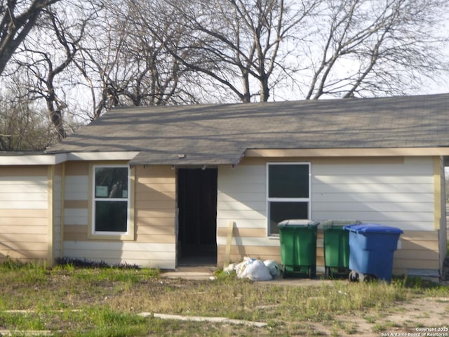 301 Sims, San Antonio, TX 78225 - view of front facade featuring roof with shingles