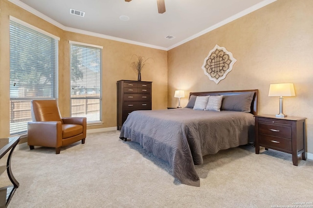 bedroom featuring light carpet, visible vents, and ornamental molding