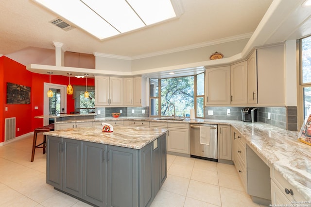 kitchen featuring gray cabinets, visible vents, dishwasher, and a sink