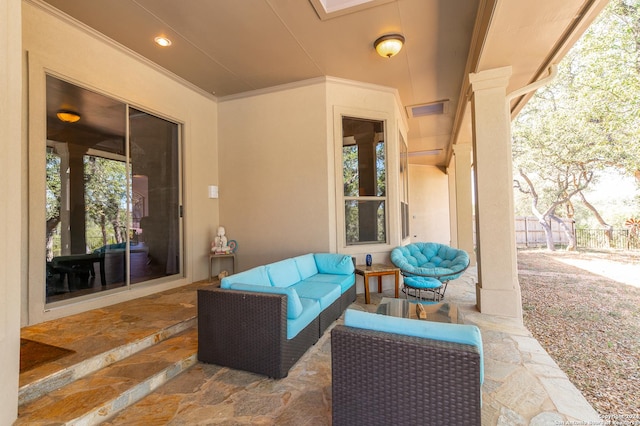 view of patio featuring fence and an outdoor living space