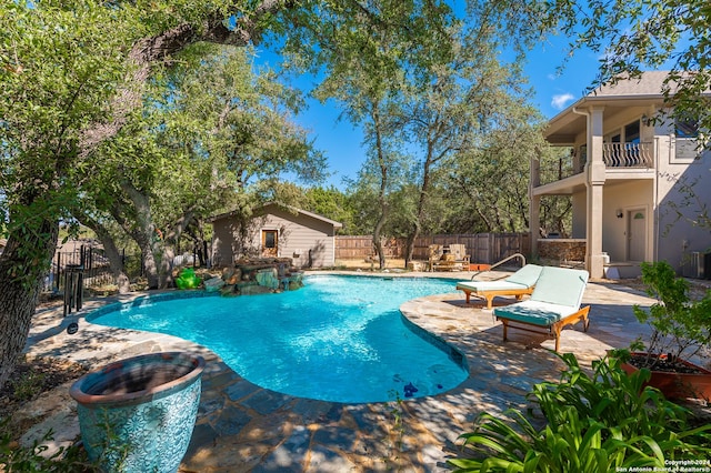 view of pool with a fenced in pool, a patio area, and a fenced backyard