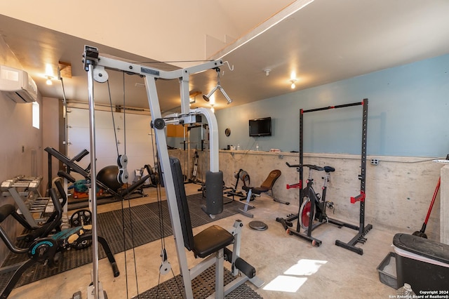 workout room with an AC wall unit