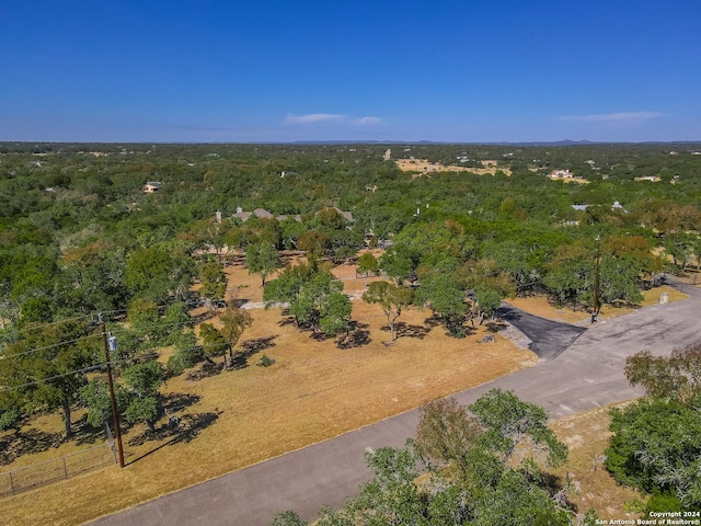 drone / aerial view with a view of trees