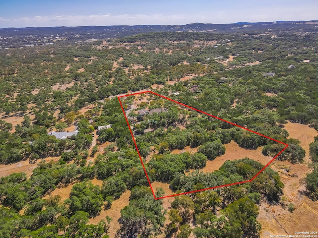 aerial view with a wooded view