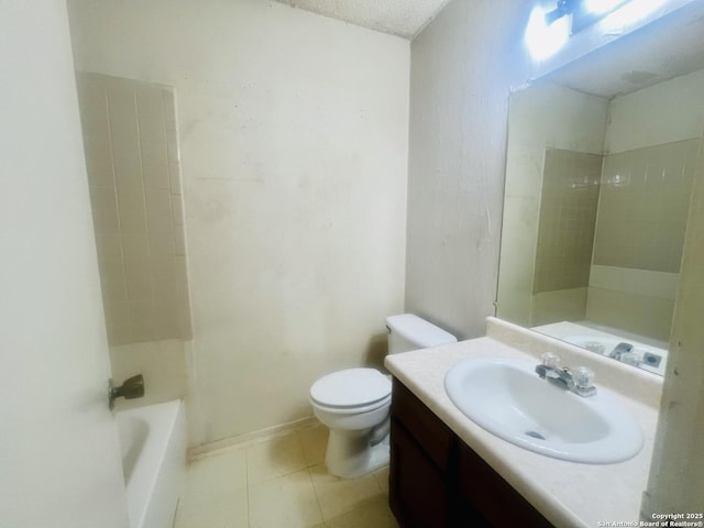 bathroom featuring toilet, tile patterned flooring, and vanity