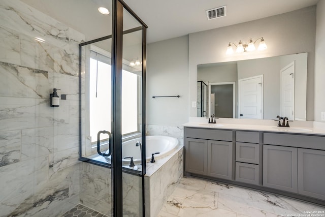 bathroom featuring a sink, visible vents, a bath, and a shower stall