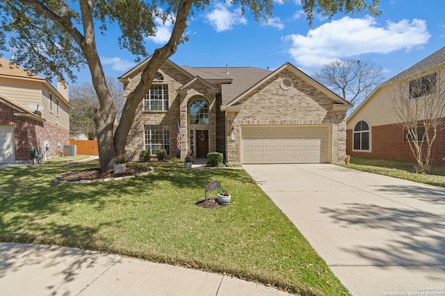 traditional home with a garage, brick siding, fence, concrete driveway, and a front lawn