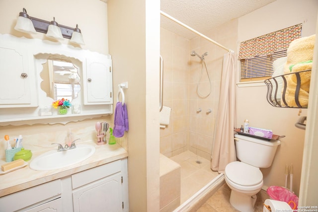 full bath with toilet, a shower stall, a textured ceiling, vanity, and tile patterned floors