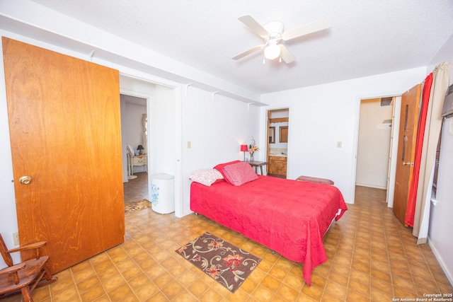 bedroom with ceiling fan and tile patterned floors