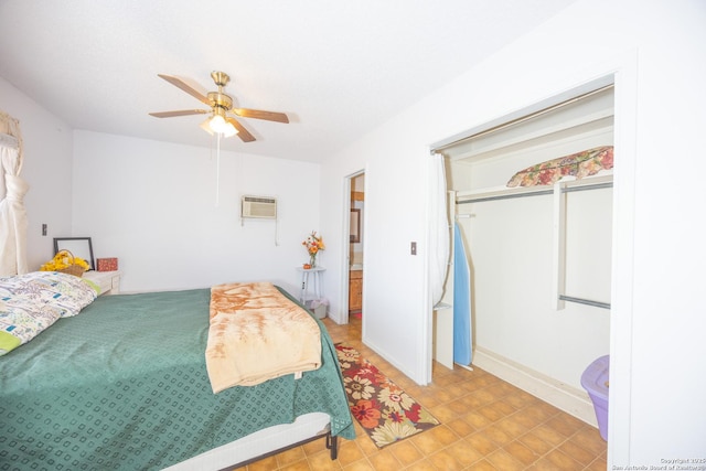 bedroom with a closet, an AC wall unit, and ceiling fan