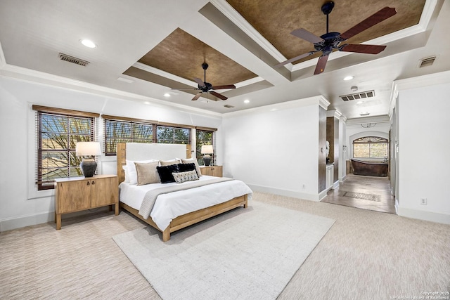 bedroom featuring ornamental molding, multiple windows, and visible vents