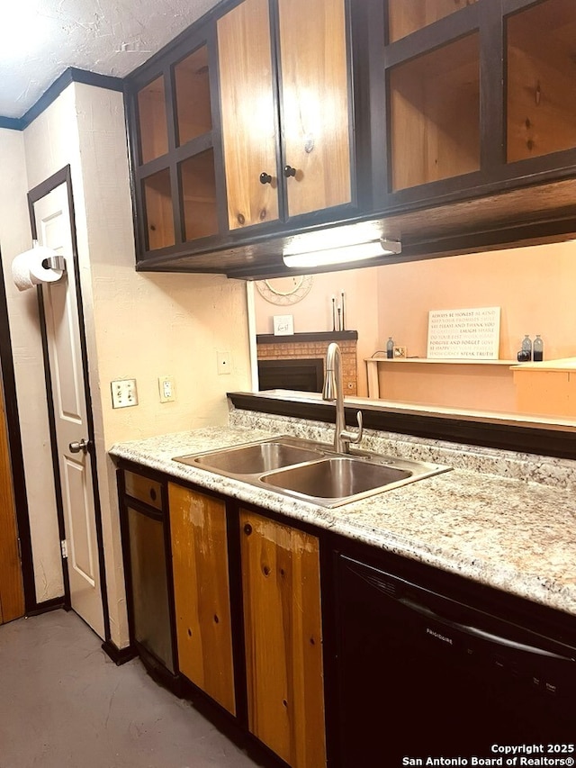 kitchen featuring black dishwasher, glass insert cabinets, a sink, light stone countertops, and concrete flooring