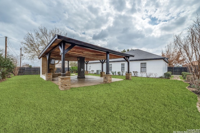 view of yard with a patio and a fenced backyard