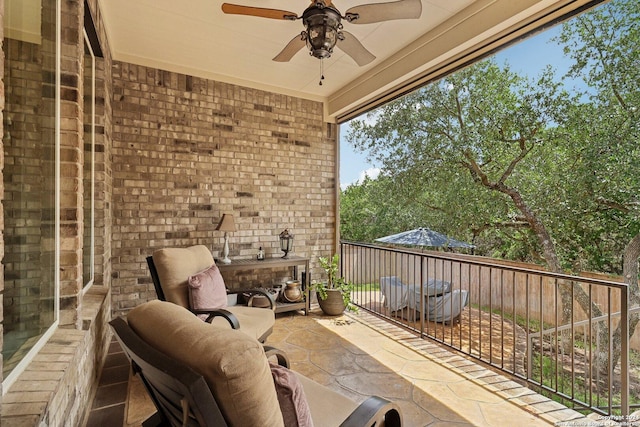 view of patio / terrace featuring ceiling fan