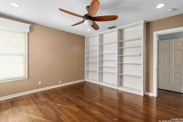 unfurnished bedroom with recessed lighting, wood finished floors, visible vents, and baseboards