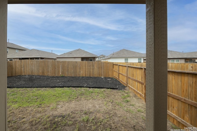 view of yard featuring a fenced backyard