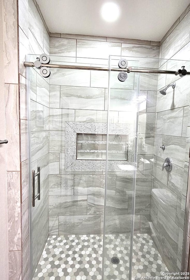 full bath featuring a stall shower