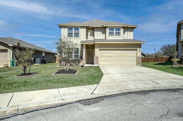 view of front of house featuring concrete driveway, board and batten siding, fence, a garage, and a front lawn