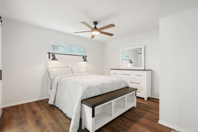 bedroom featuring a ceiling fan, dark wood-style flooring, and baseboards