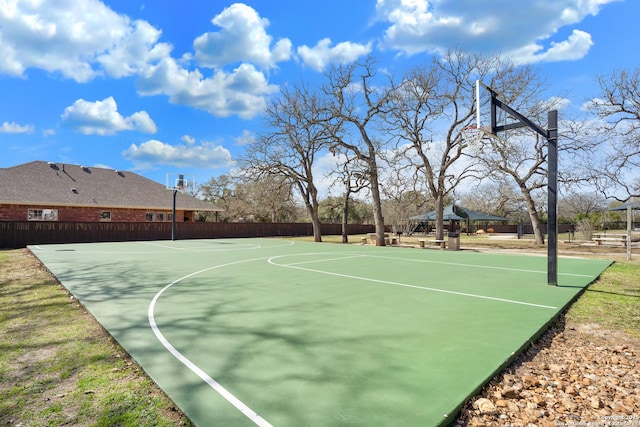 view of sport court with community basketball court and fence