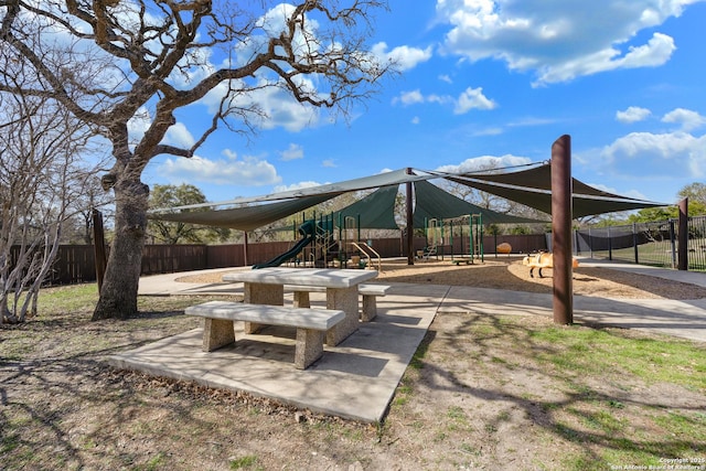 surrounding community with playground community and fence