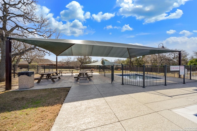 surrounding community featuring fence