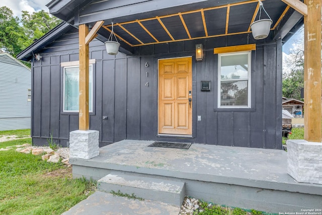 property entrance with board and batten siding