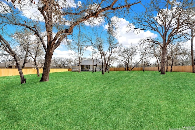 view of yard featuring fence