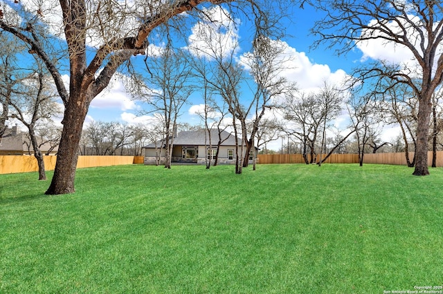 view of yard with fence