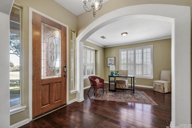 entrance foyer featuring plenty of natural light and hardwood / wood-style floors