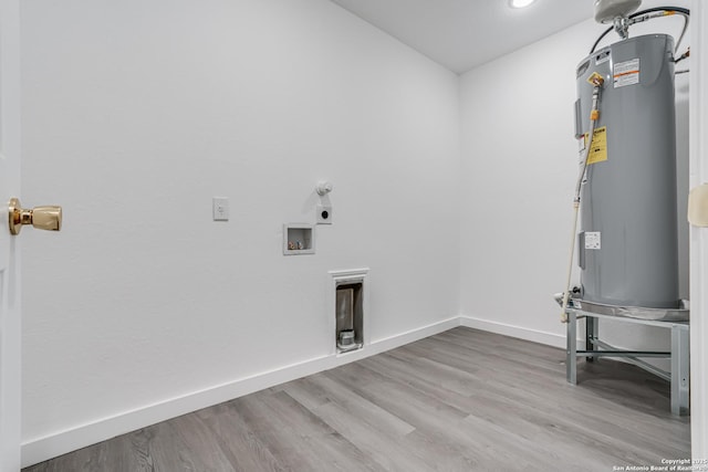 laundry area featuring hookup for a washing machine, water heater, electric dryer hookup, wood finished floors, and laundry area